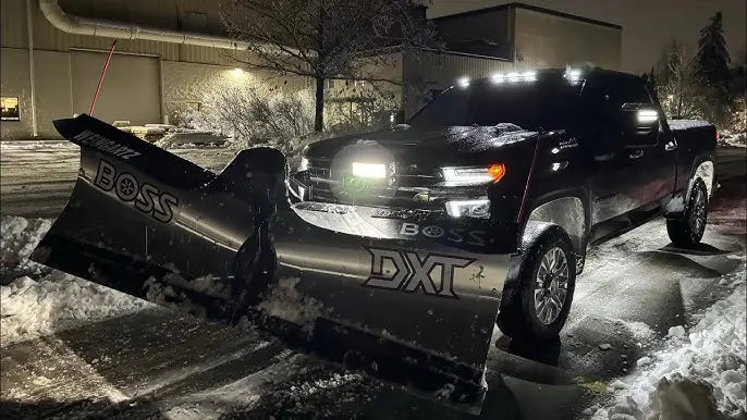 Plow truck at night