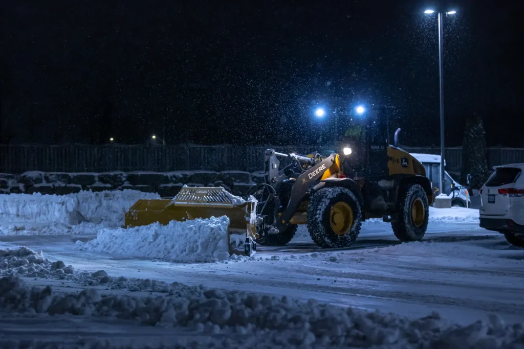 Loader Front end loader clearing snow